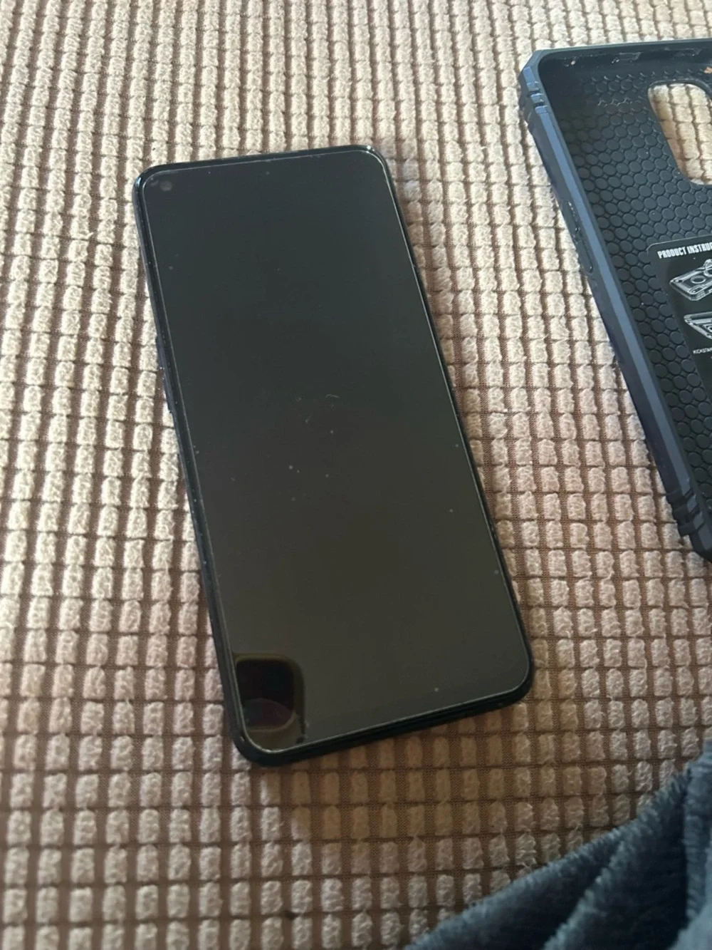 Motorola Black Phone with Blue Logo Display for metro pcs.